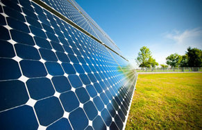 Solar PV panels in a sunny field